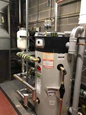 Large unvented boiler in boiler room